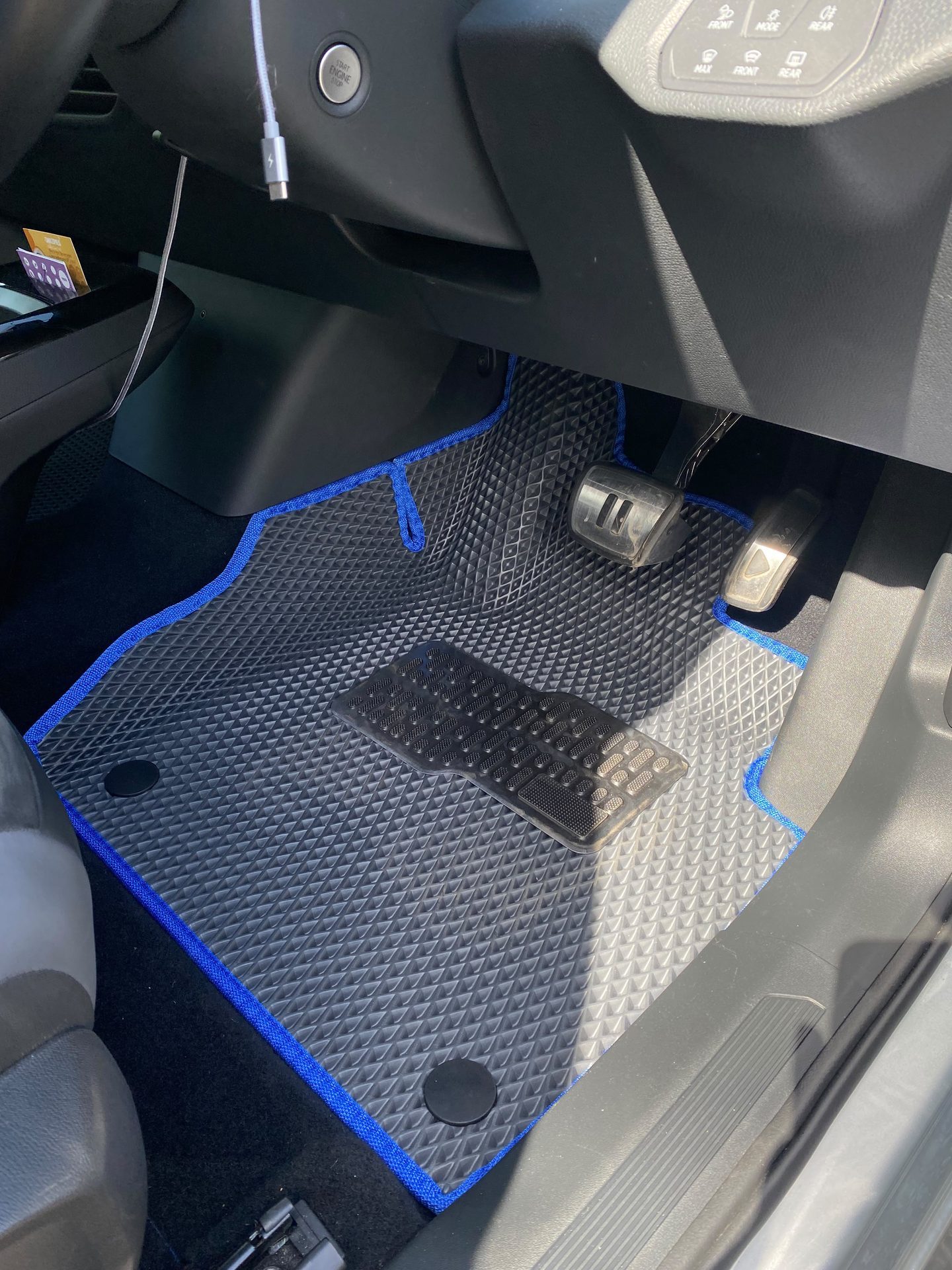 EVA driver mat with blue edge fitted in a VW ID.4